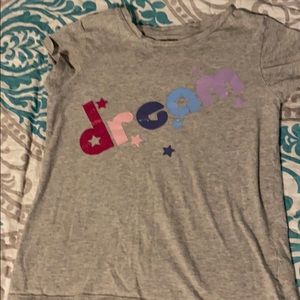 Girls grey shirt with Dream logo